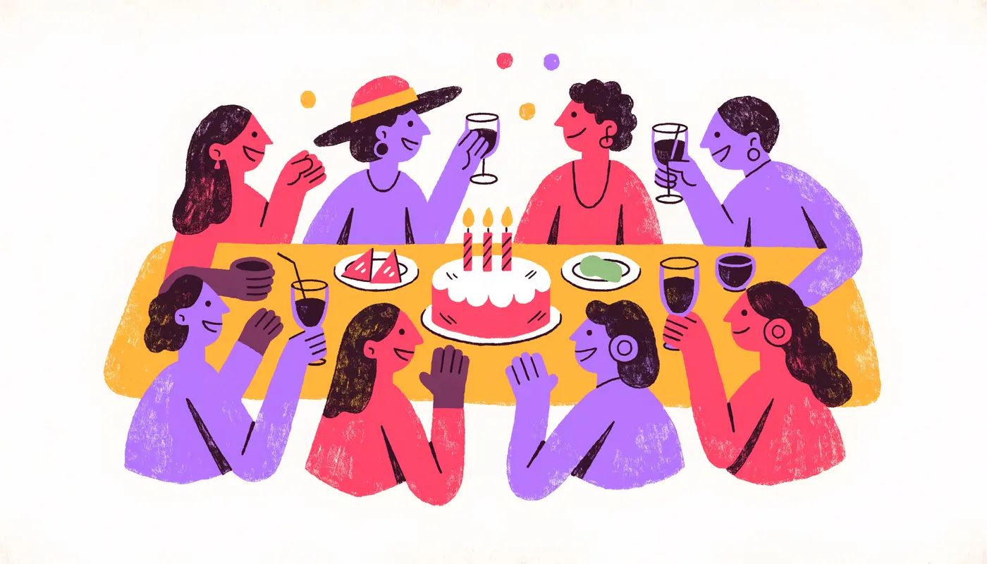 Une tablée d'amis et de proches qui trinquent autour d'un gâteau d'anniversaire, sous des confettis.